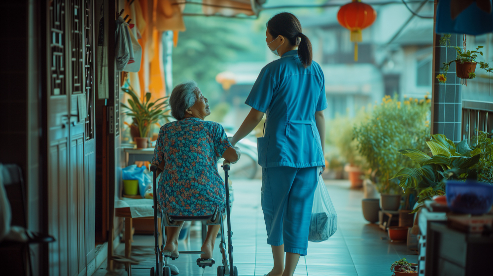 Caregiver assisting senior patient at home in Mumbai